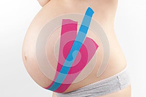 Kinesio tape on pregnant.