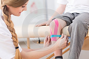 Kinesio taping therapy after knee injury
