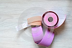 Kinesiological tape rolls. Anti-pain taping for athletes for weight loss, anti-wrinkle