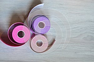 Kinesiological tape rolls. Anti-pain taping for athletes for weight loss, anti-wrinkle