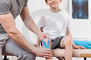 Kinesiology tape on the knee