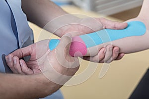 Kinesiology taping after wrist injury