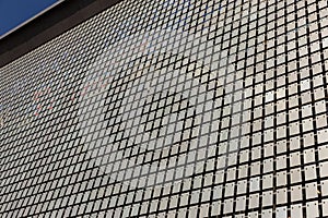 The kinetic facade of the building. Stainless steel metal plates