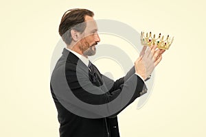 King attribute. Become next king. Monarchy family traditions. Man nature bearded guy in suit hold golden crown symbol of