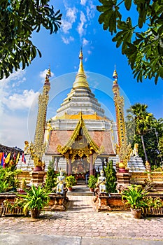 King Bumibhol stands in front of the white Chedi at Wat Chang Yuen,Thailand, Chiang Mai