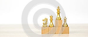 King chess pieces stand with team in vertical concepts of challenge of leader business teamwork volunteer or wining and leadership