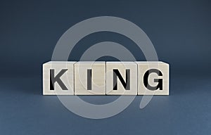 King. Cubes form the word King