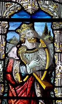 King David with harp in stained glass