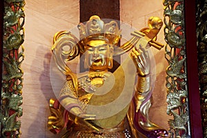 King of the east and God of music in Four Heavenly Kings are four Buddhist gods at Chinese temple at Chinese temple photo