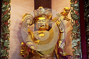 King of the east and God of music in Four Heavenly Kings are four Buddhist gods at Chinese temple at Chinese temple