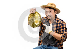 King of fruit in Thailand , Asian man farmer holding Mon Thong Durian isolated