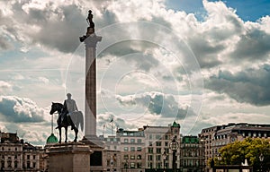 King George IV and the Nelson column in Trafalgar Square vs dramatic sky.