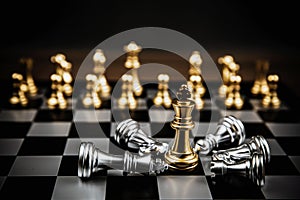 King golden chess standing confront of in the middle of the falling silver chess