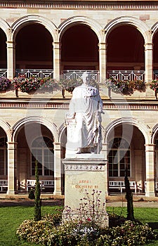 The King Ludwig marble statue in the spa gardens, and in front of the arcades in Bad Kissingen