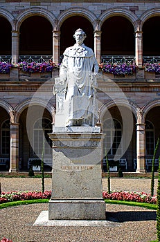 The King Ludwig marble statue in the spa gardens, and in front of the arcades in Bad Kissingen