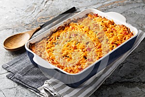 King Ranch Casserole layers of juicy chicken, corn tortillas and cheese enveloped in a cream sauce with tomatoes, bell peppers and
