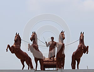 King riding Horse Chariot