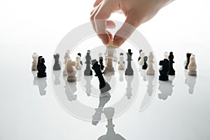 King `s fall in the chess game. Biznets concept. Disposal of the competition