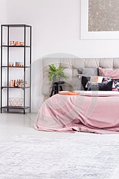 King-size bed and metallic items