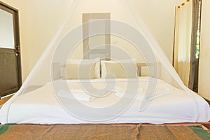 King size bed and net curtains bedrooms