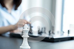 King standing in front of people hand move chess with strategy and tactic to win enemy, play battle on board game, business