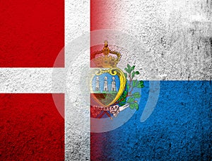 The Kingdom of Denmark National flag with The Republic of San Marino National flag. Grunge Background