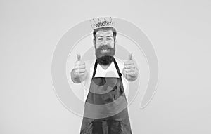 Kingdom of tastes. Cook food. Cook with beard and mustache yellow background. Royal recipe. Man king cook wear cooking
