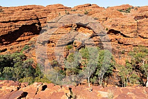 Kings canyon landscape with red sandstone domes and staircases pathway during the Rim walk in outback Australia