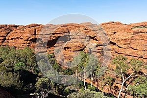 Kings canyon landscape with red sandstone domes and staircases pathway during the Rim walk in outback Australia