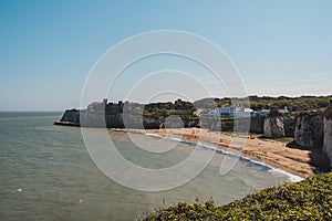 Kingsgate Castle on the top of the cliffs at the Kingsgate beach on sunny day