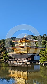 Kinkaku Temple in Kyoto Japan in front of a pond