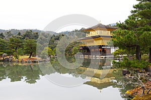 Kinkakuji Golden Pavilion shining in Kyoto photo