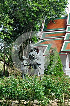 Kinnaree sculpture in flower garden of Phuping Rajanives, the main building of the Winter Palace