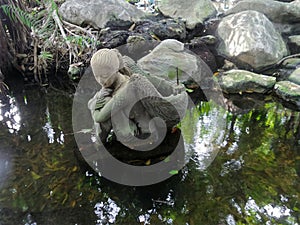 Kinnaree sculpture in the pond