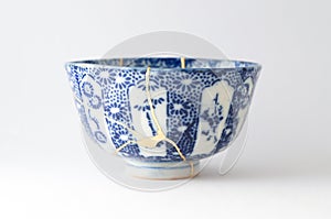 Antique blue bowl restored with antique kintsugi real gold technique