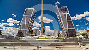 KIO towers or Gateway of Europe timelapse from Plaza de Castilla in Madrid, Spain.