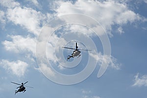 Kiowa Warrior helicopters during an air show. Greek Air Force Bell OH-58 flying in Thessaloniki, Greece during the National Oxi