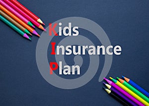 KIP kids insurance plan symbol. Concept words KIP kids insurance plan on beautiful black paper. Beautiful black background. photo