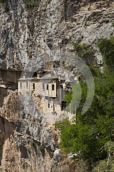 Kipinas manastery building high in cave and rocks photo