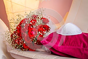Kippah and bouquet with red roses