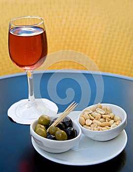 Kir cassis and nibbles