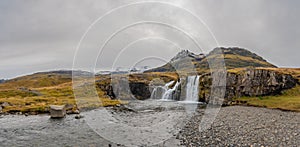 Kirkjufell in Iceland Kirkjufellsfoss waterfall panorama of complete setting