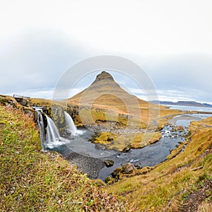 Kirkjufell in Iceland Kirkjufellsfoss waterfall square panorama of fall and famous mountain