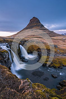 Kirkjufell mountain an iconic natural landmark of Iceland located at Snaefellsnes peninsula, near the town of Grundarfjordur.