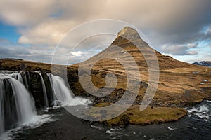 Kirkjufell mountain and kirkjufellfoss waterfall grundarfjordur. Snaefellsnes peninsula Iceland