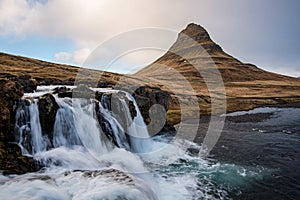 Kirkjufell mountain and the kirkjufellfoss waterfall in Iceland