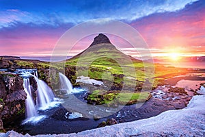 Kirkjufell at sunrise in Iceland. Beautiful landscape and sunrise photo