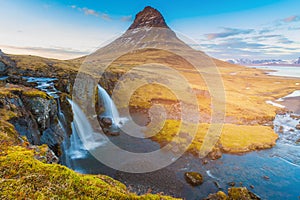 Kirkjufell volcano with waterfall