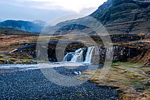 Kirkjufellfoss waterfall in the town of Grundarfjorur in western Iceland