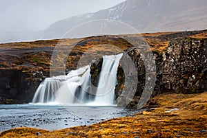 Kirkjufellsfoss waterfal in Snaefellsnes peninsula of Iceland